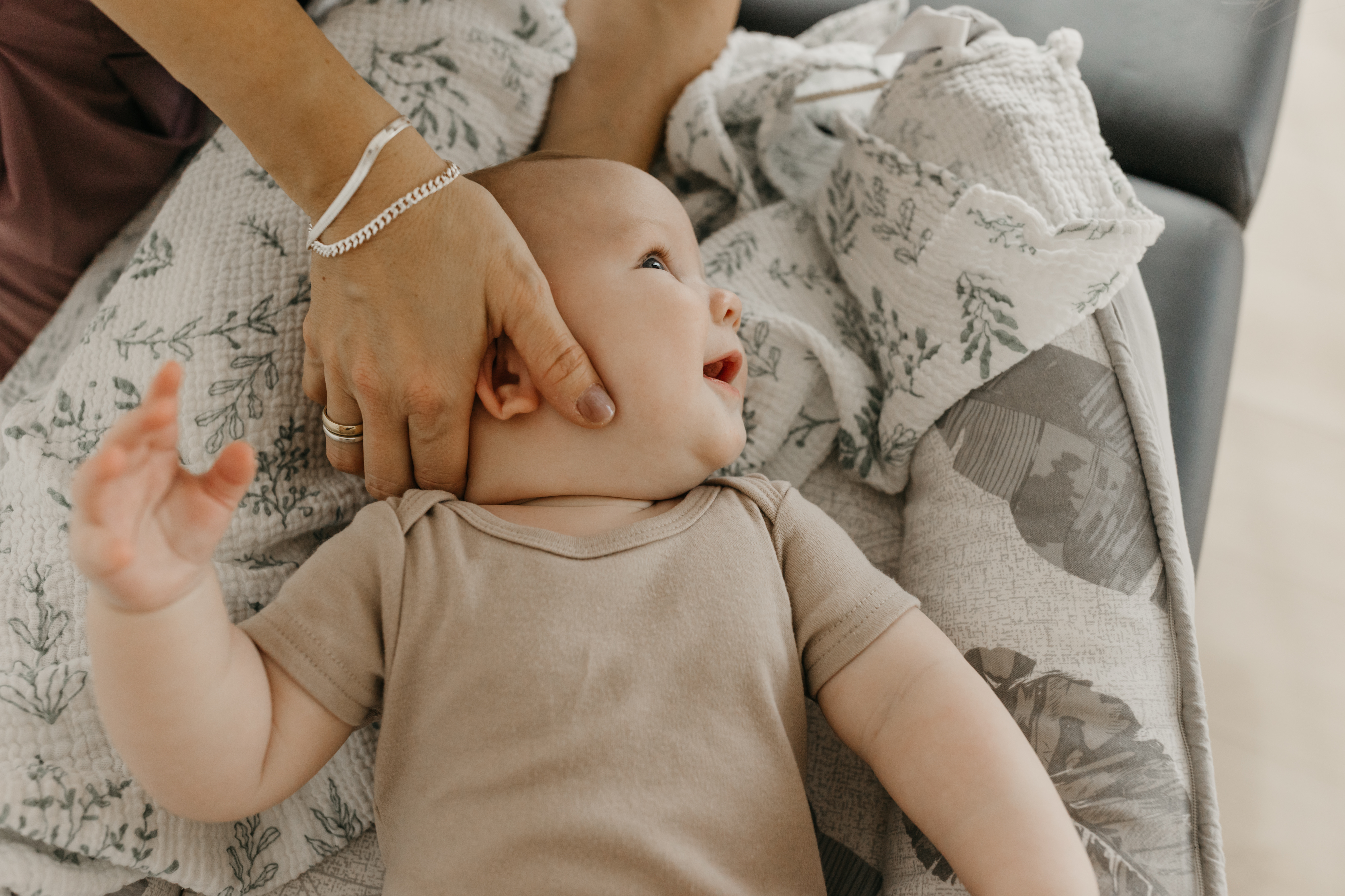 Parent and child practicing hands-on family wellness techniques