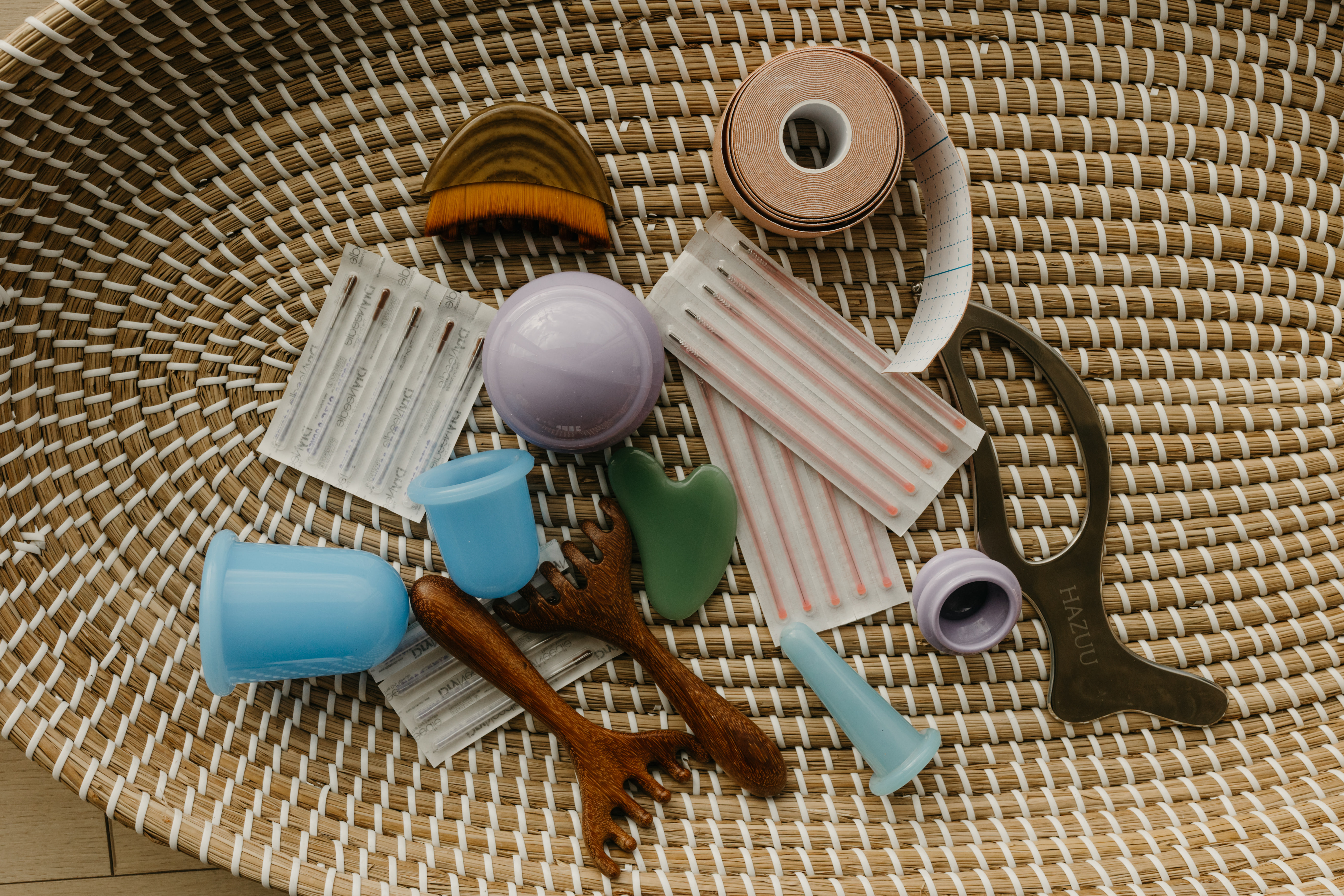 Gua sha tool used for muscle tension and fascial release